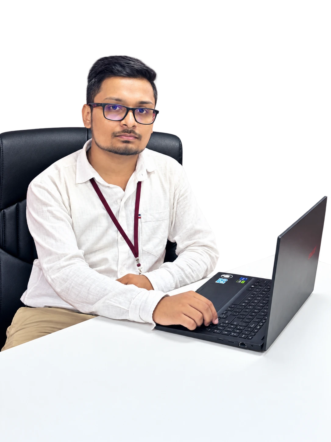 Ashan Sanchitha seated at his laptop